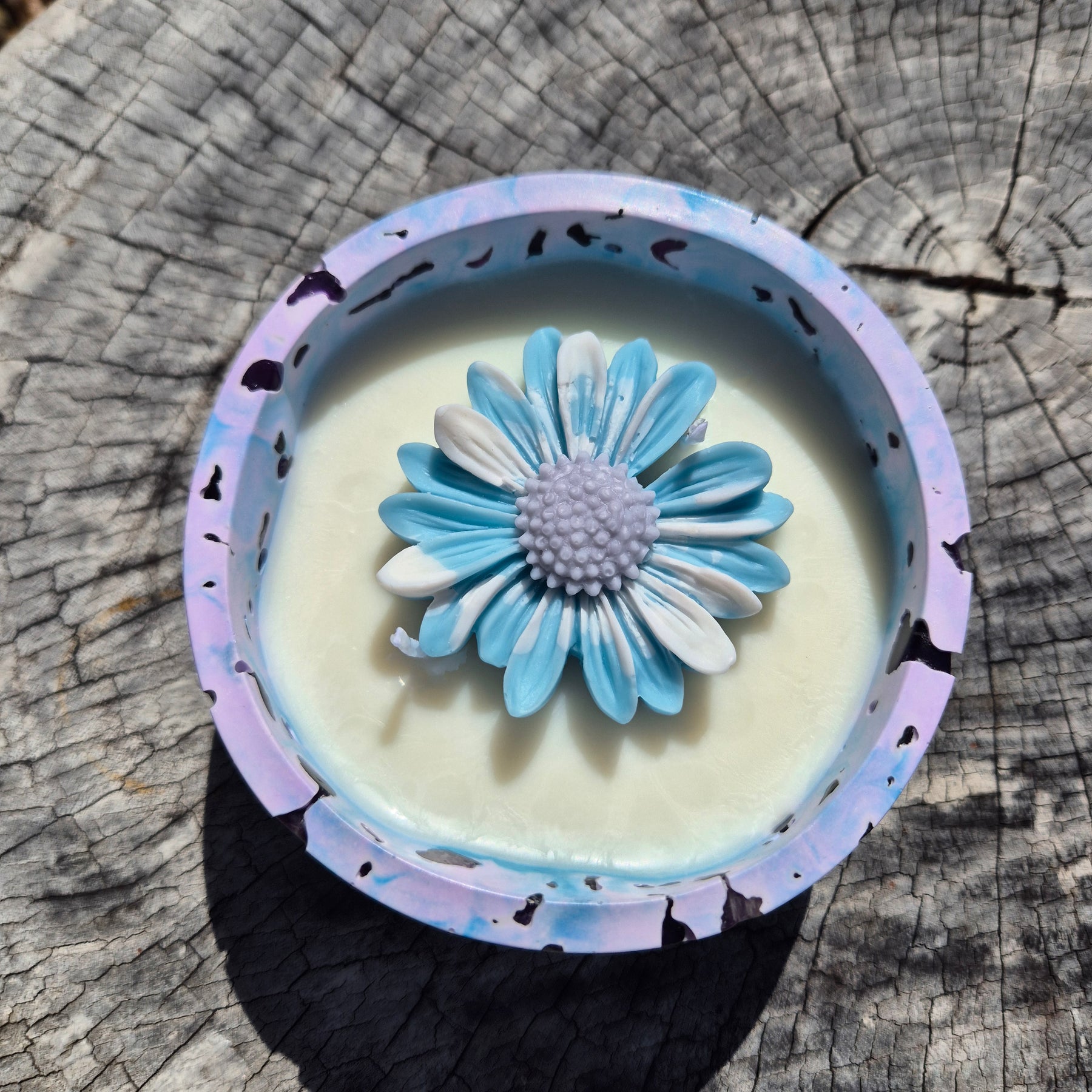 Round blue and purple concrete bowl candle with amethyst stones