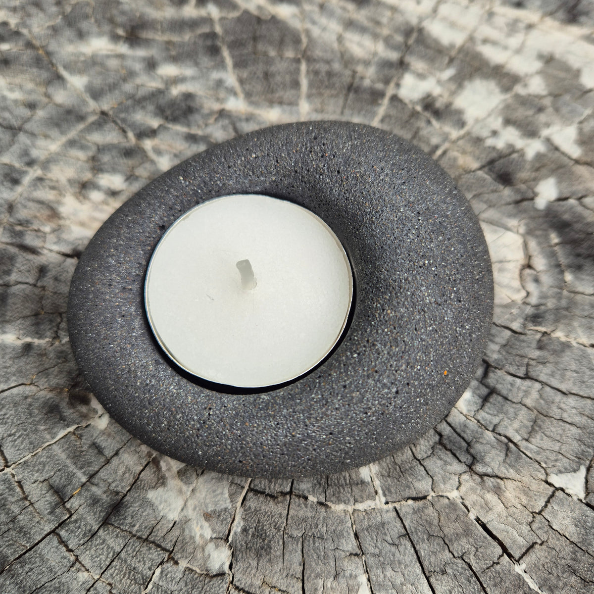 Black eco-stone pebble shaped tealight candle holder