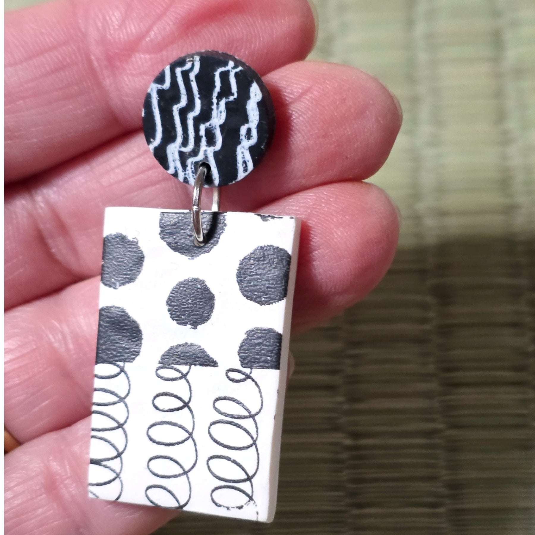 Black and white stud earrings