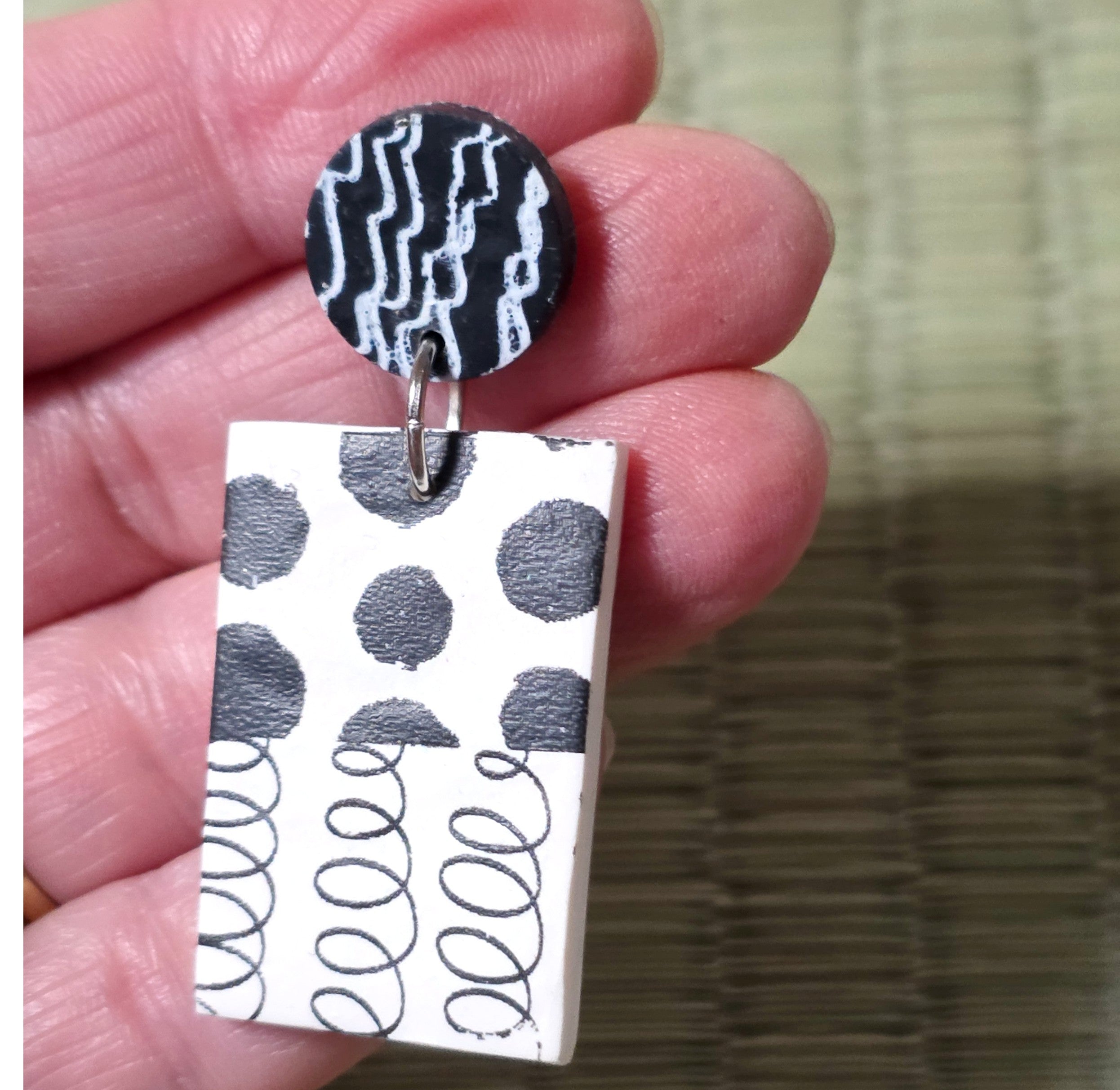 Black and white stud earrings