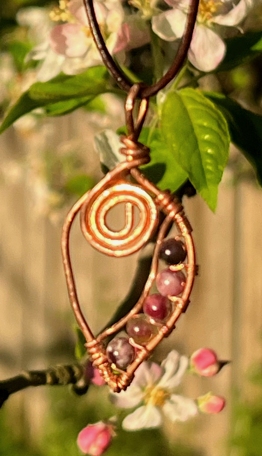 Unique Copper Spiral Gemstone Pendant with brown cord