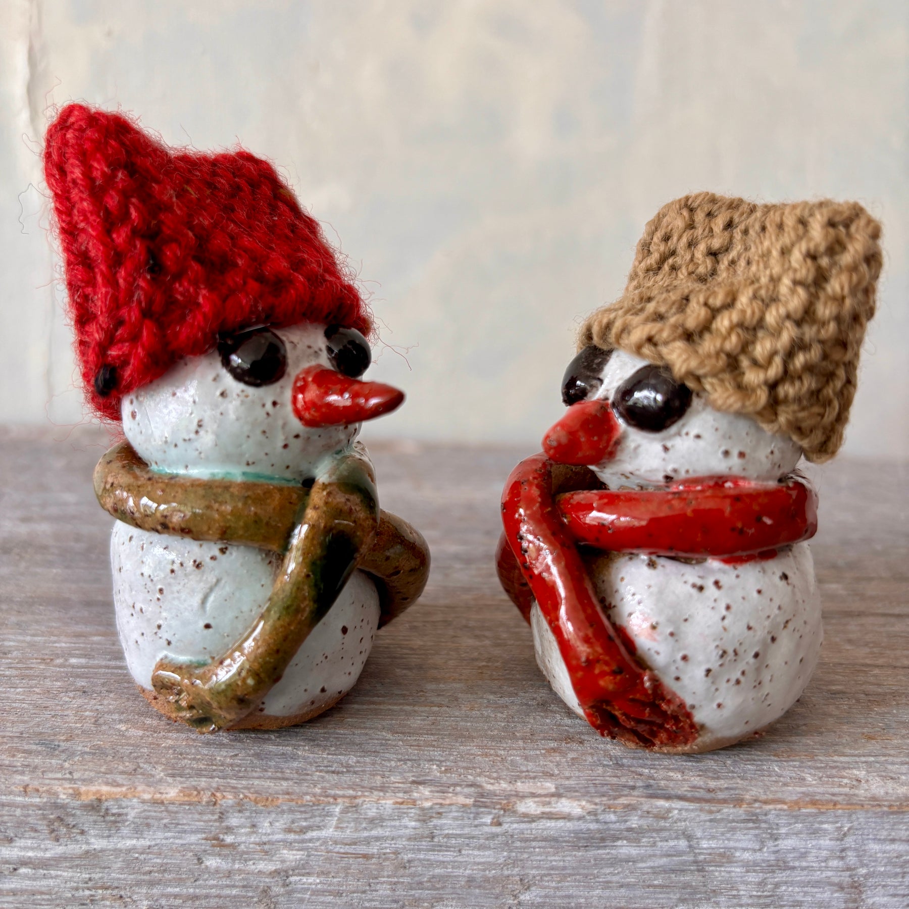 Ceramic Snowman with red hand-knitted hat (26-12)