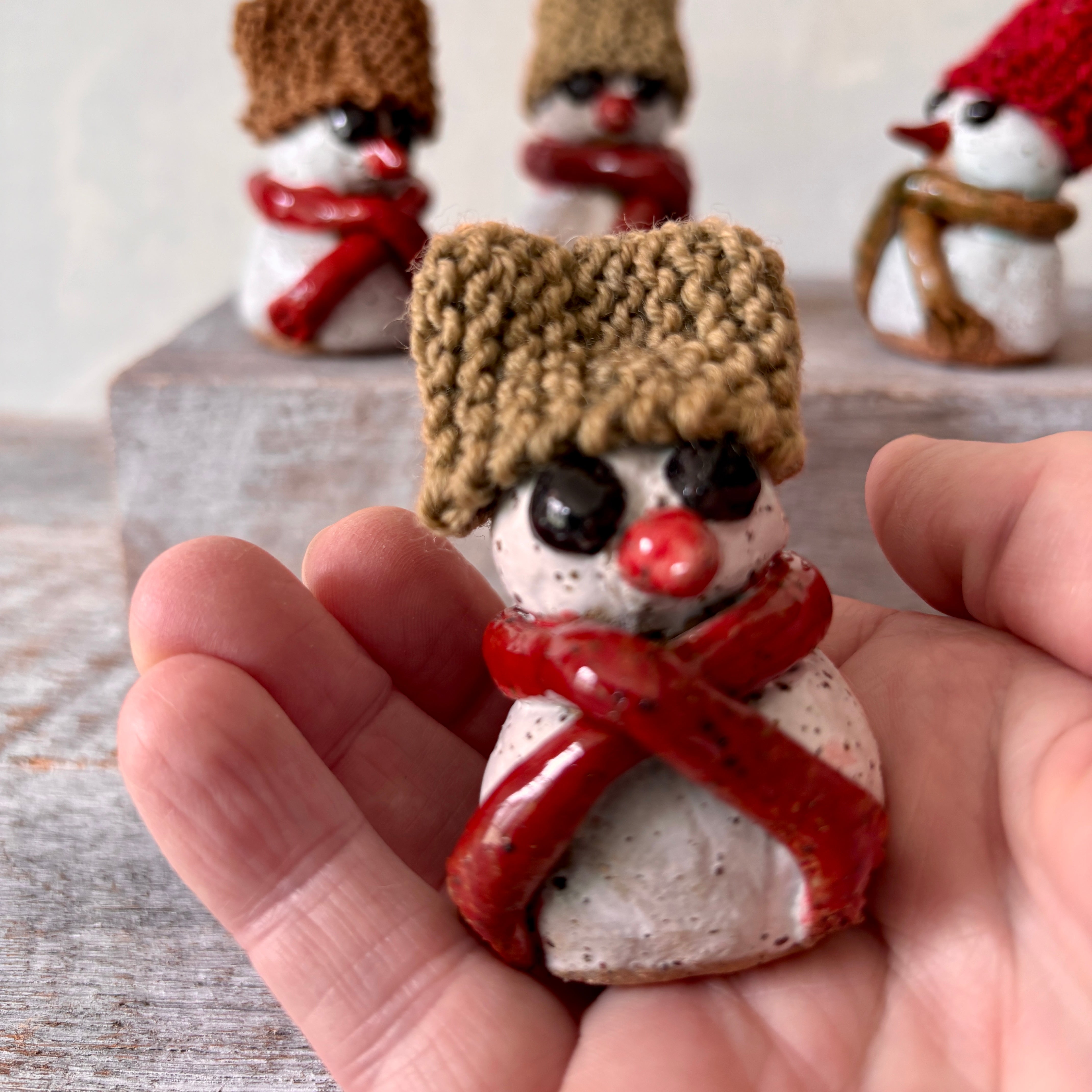 Ceramic Snowman with red hand-knitted hat (26-12)