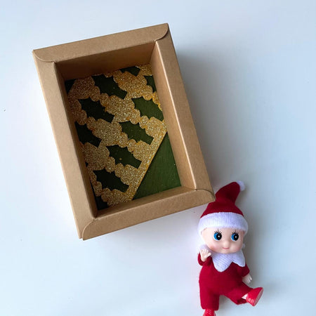Little Elf on shelf in a keepsake box