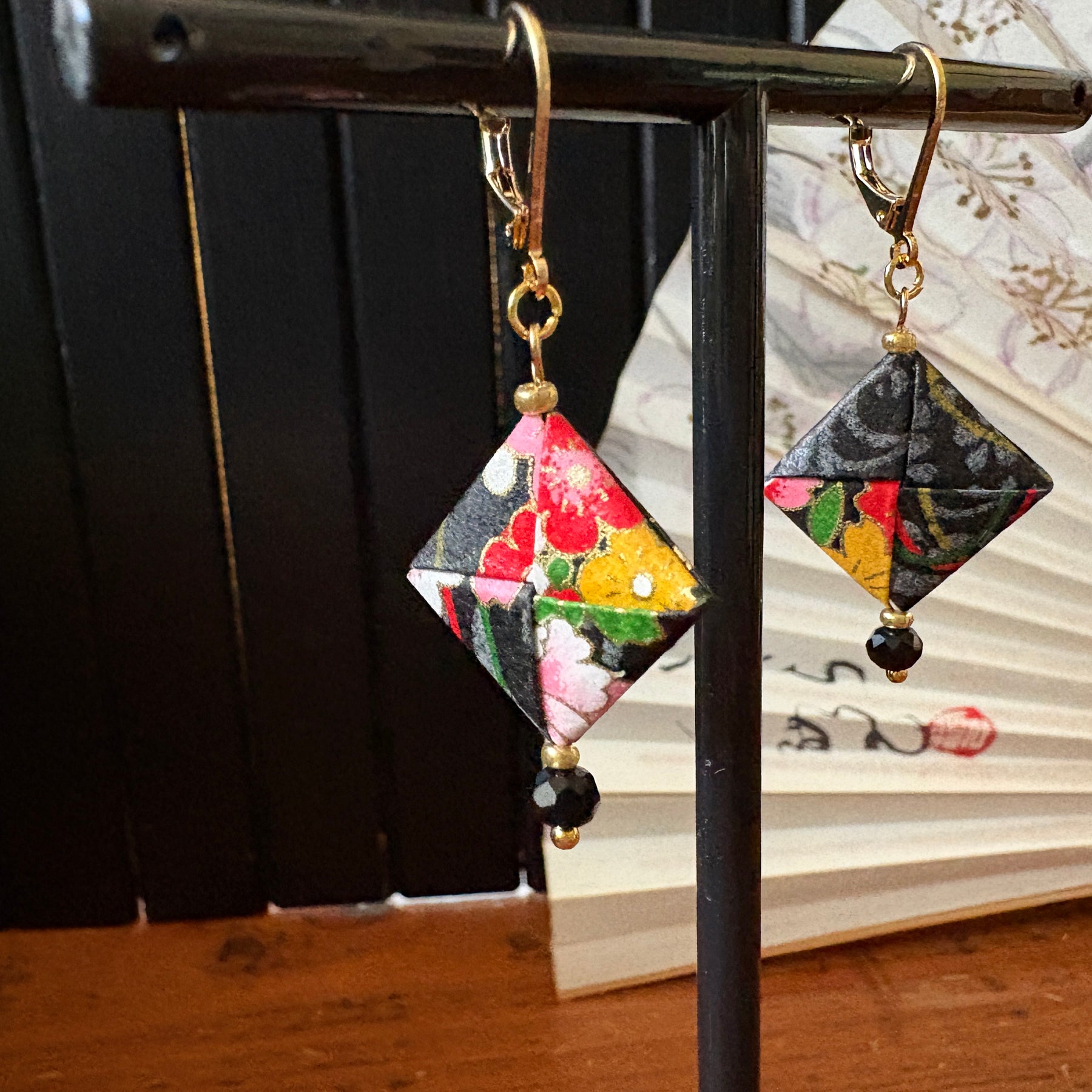 Origami Earrings – smoky black with vibrant botanicals.  Japanese Yuzen Washi