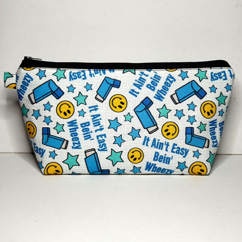 Asthma Puffer Pouch, size XL, White with Blue Inhalers, the phrase It Ain't Easy Bein" Wheezy, and yellow happy faces