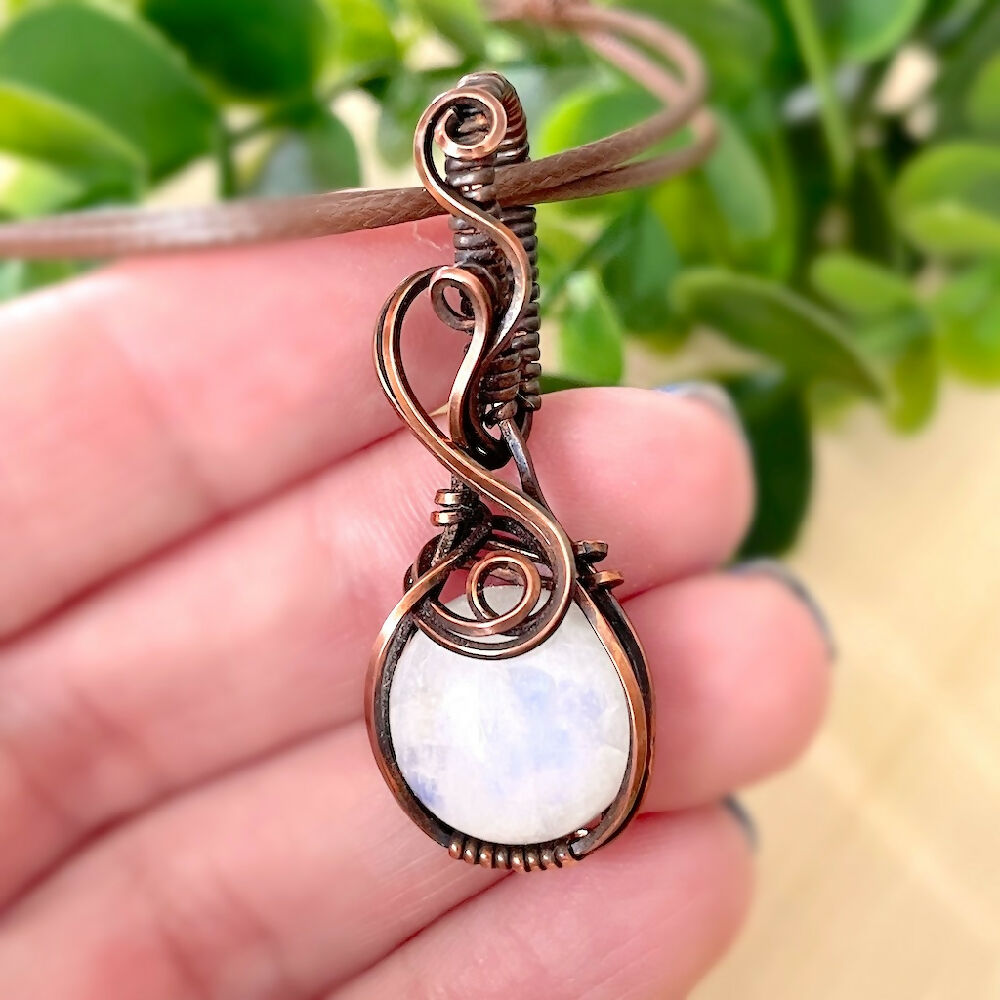 Captivating 47x17mm Wire-Wrapped Rainbow Moonstone Pendant