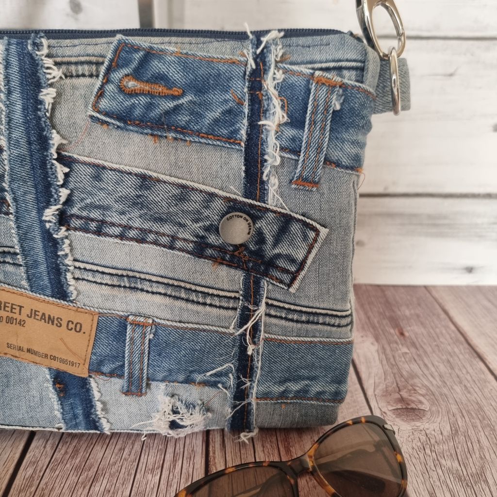 Handmade upcycled angle patched denim zip crossbody bag