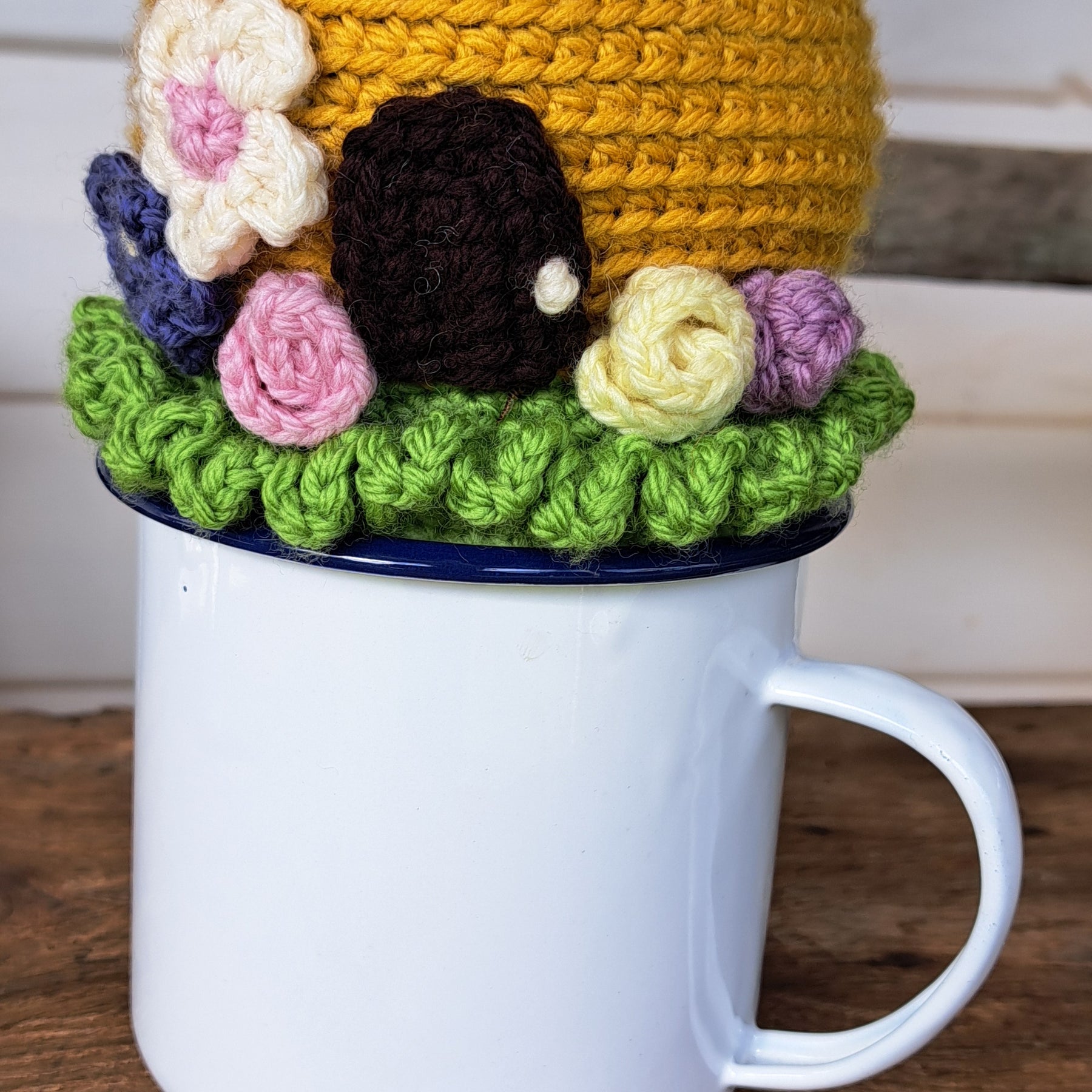 Beehive pin cushion in a sturdy enamel tin mug