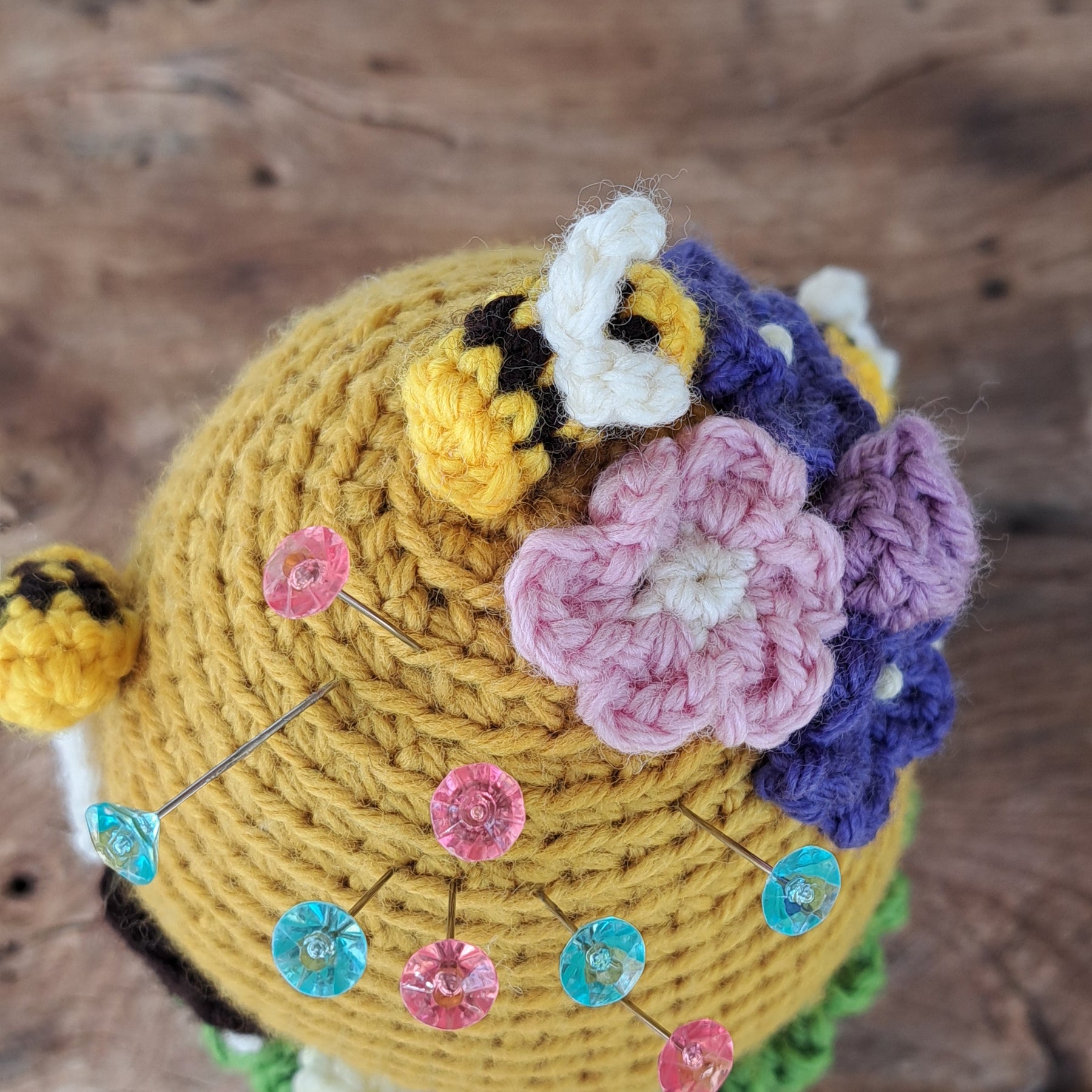 Beehive pin cushion in a sturdy enamel tin mug