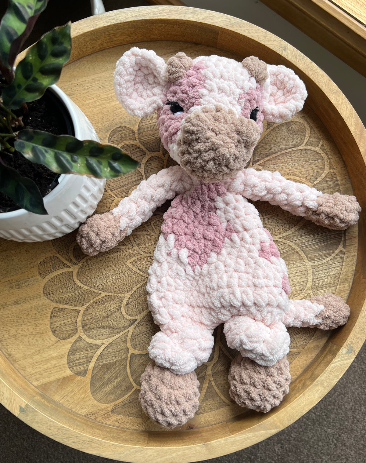 Handmade pink crochet cow lovey snuggler baby safe.