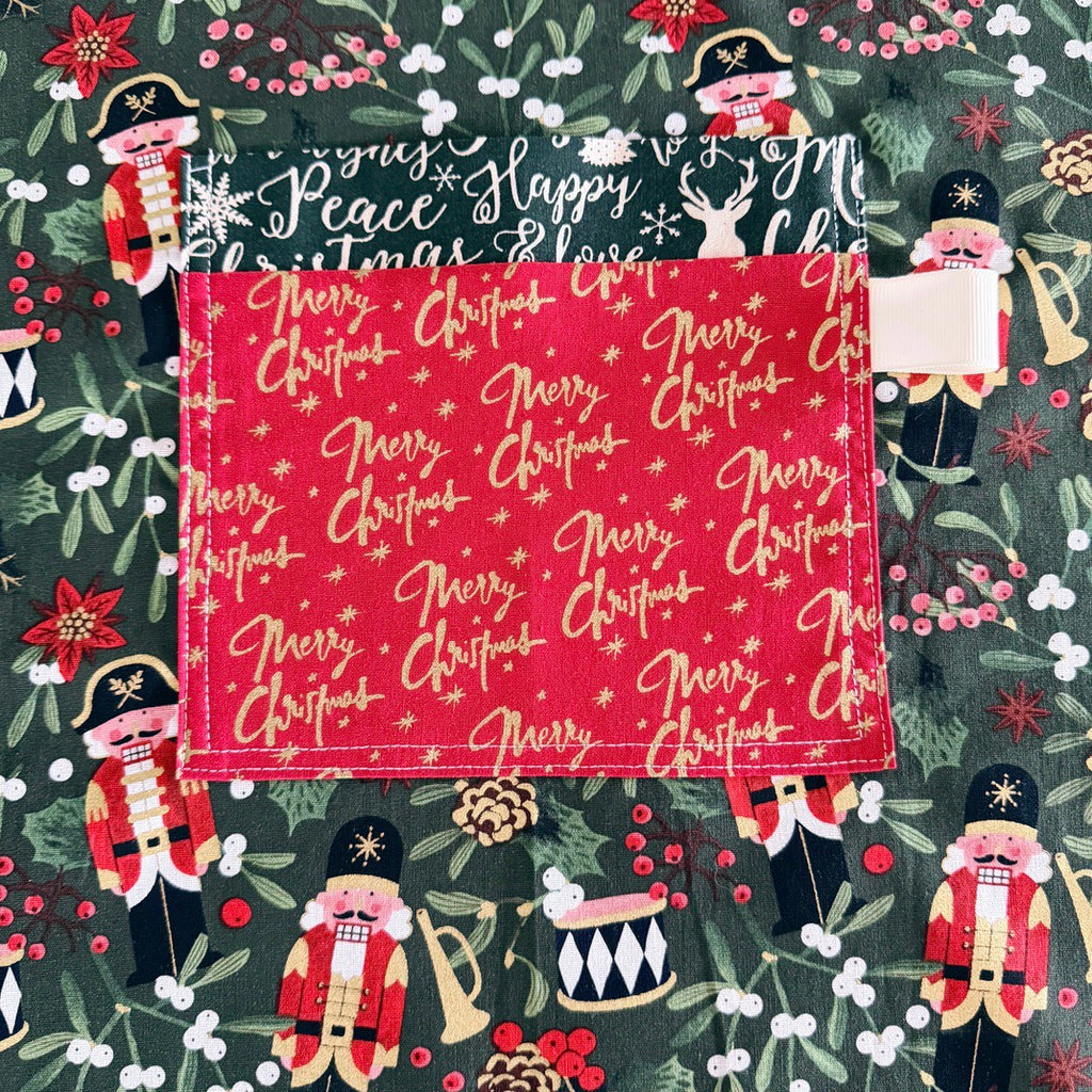 Nutcrackers ladies' Christmas tie back apron.