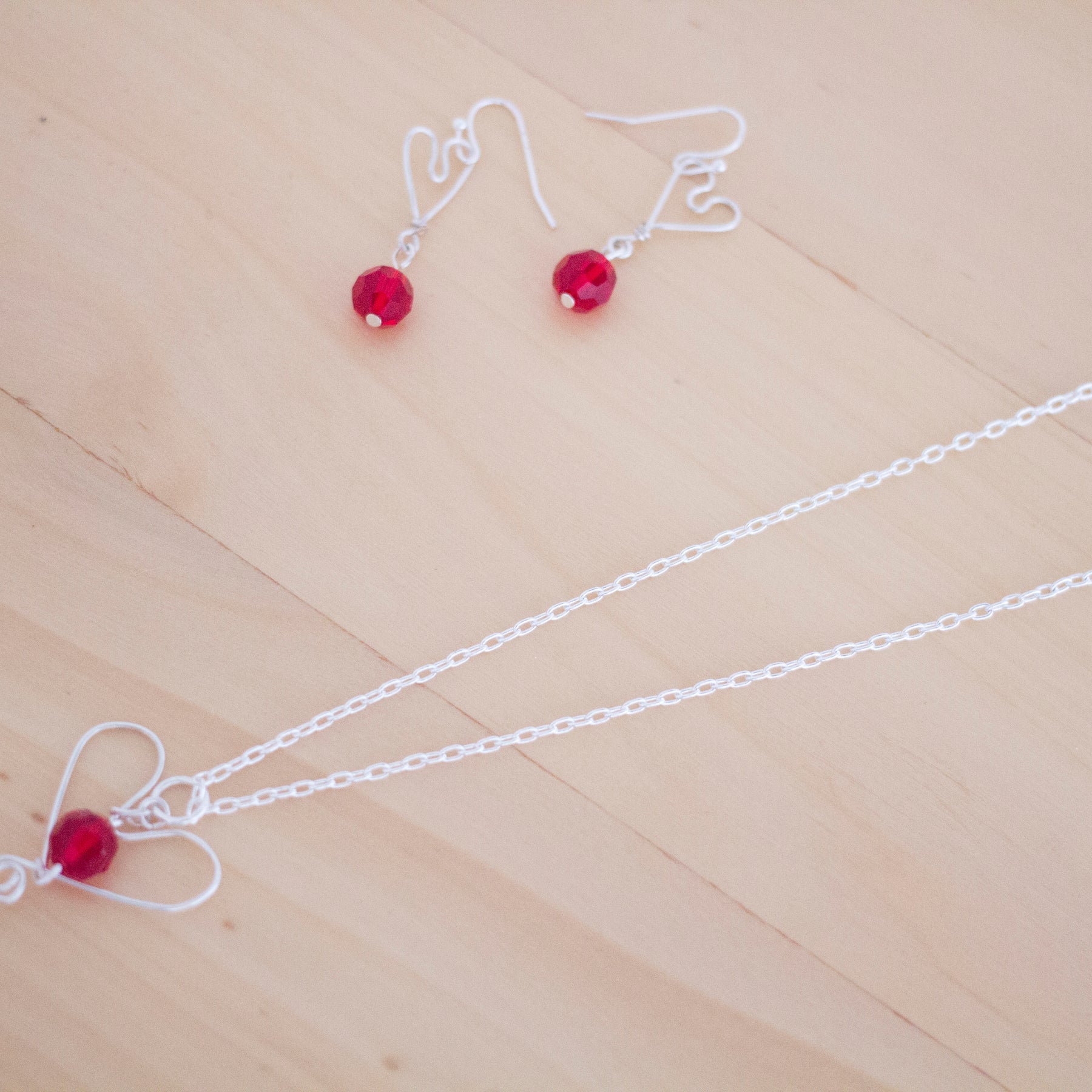 Silver Heart and Red Crystal Pendant Necklace and Earrings Set