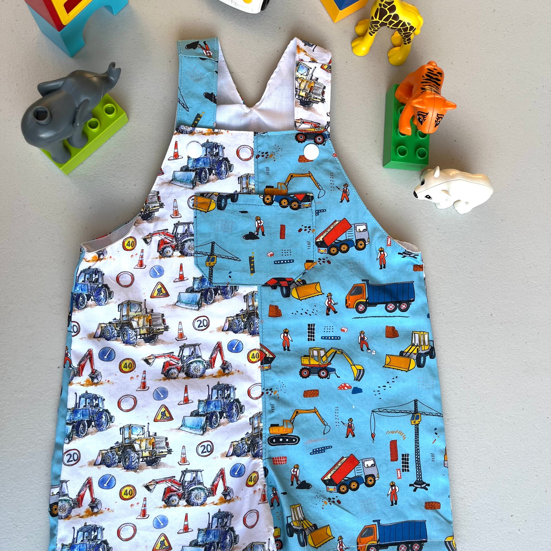 baby overalls/shorts | construction trucks