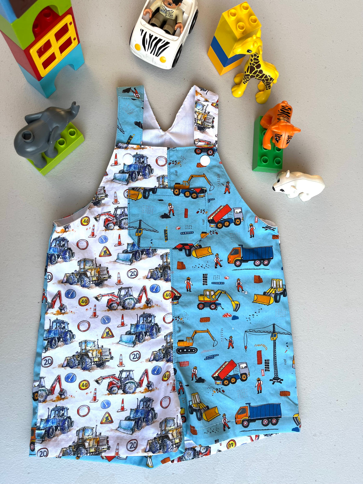 baby overalls/shorts | construction trucks