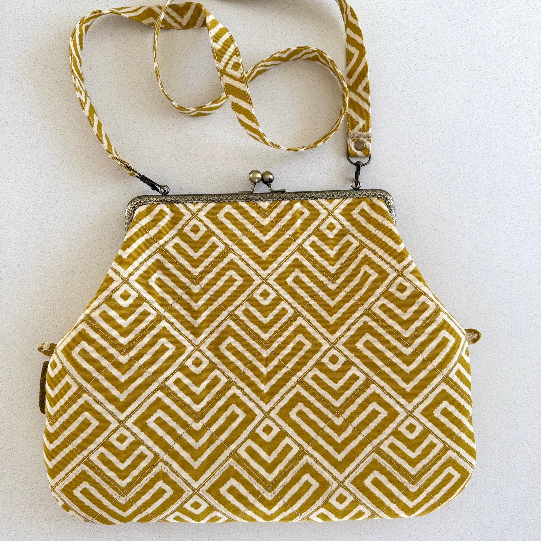 Metal frame oversized purse