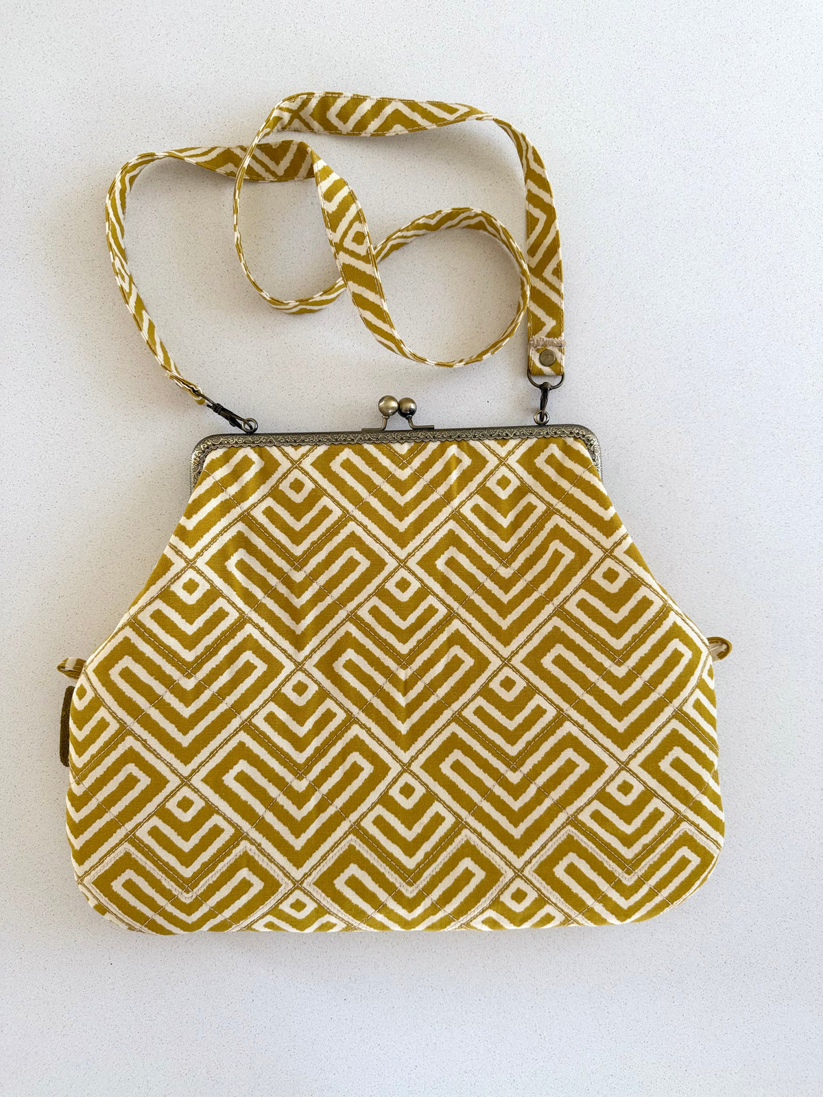 Metal frame oversized purse