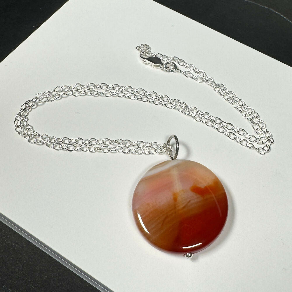 Carnelian necklace flat close up