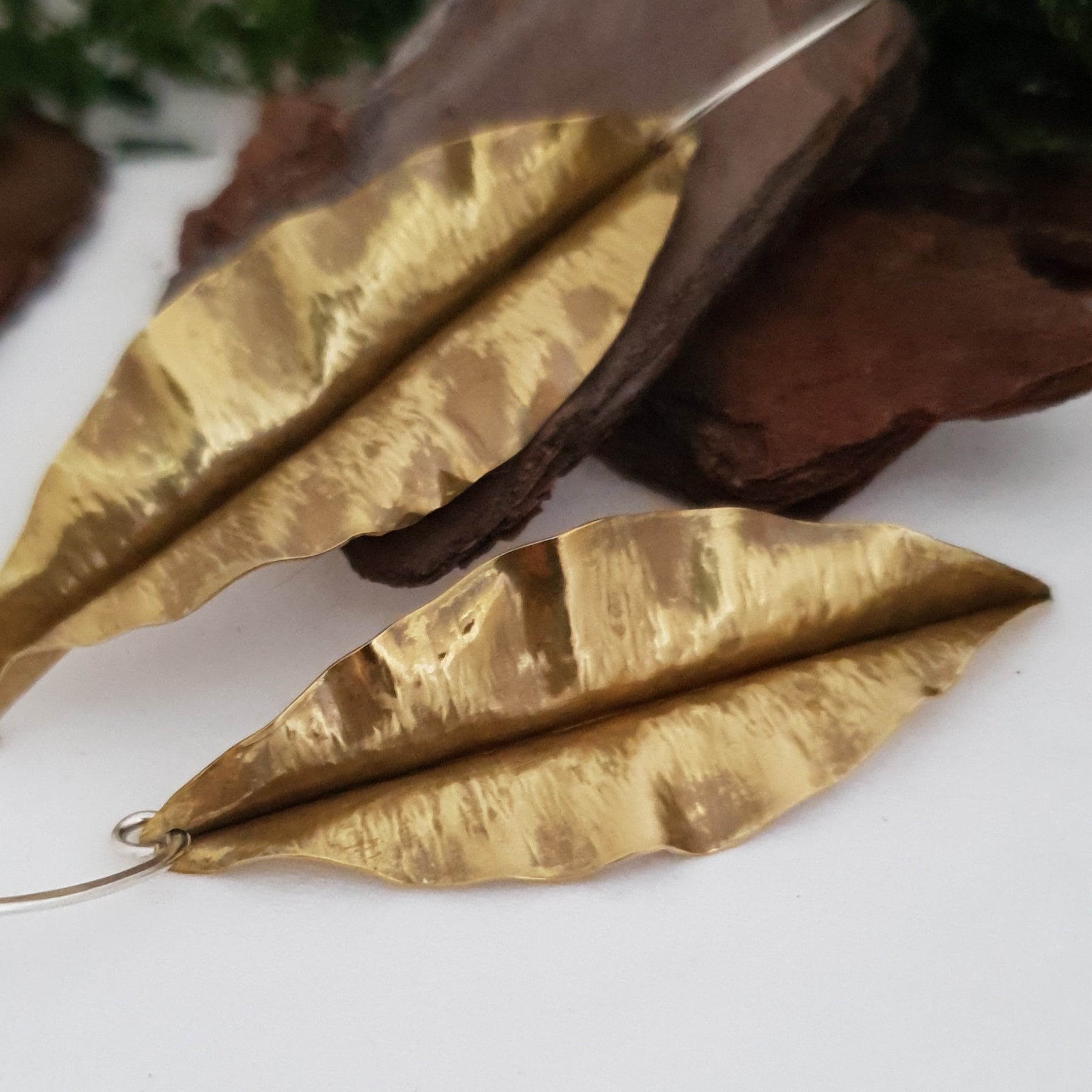 Golden brass leaf earrings