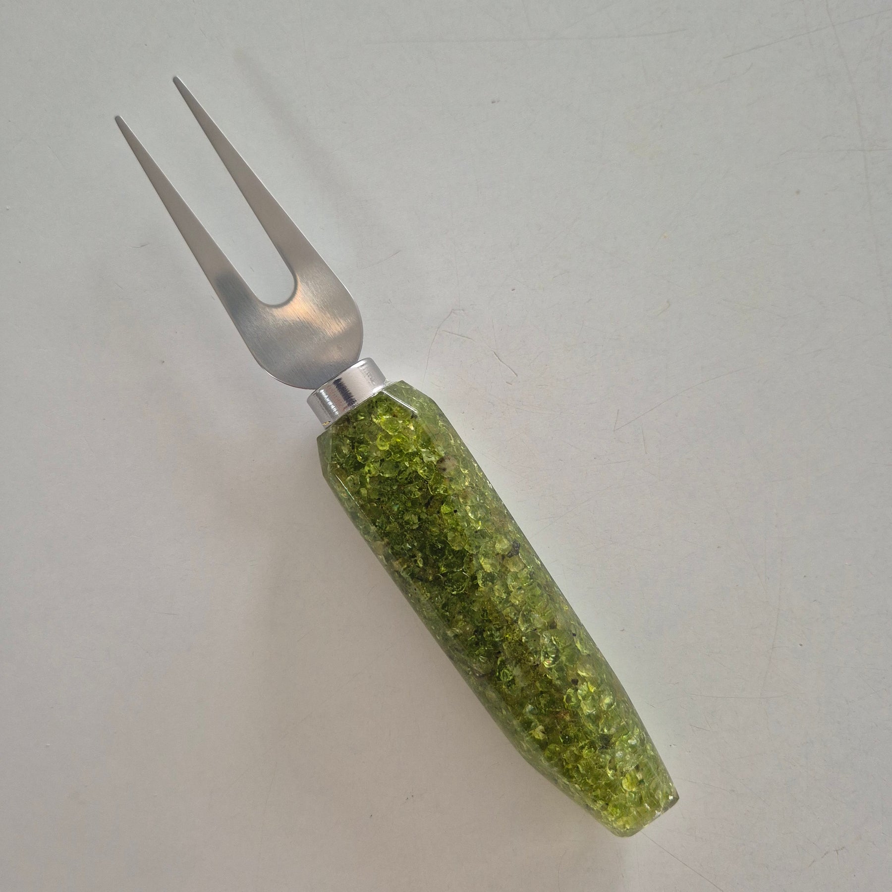 Resin bottle opener and cheese knife set with peridot