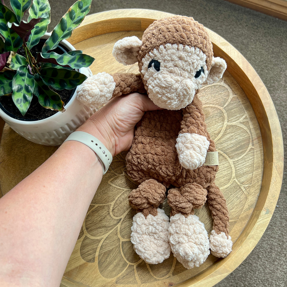Handmade modern crochet toy monkey lovey snuggler.