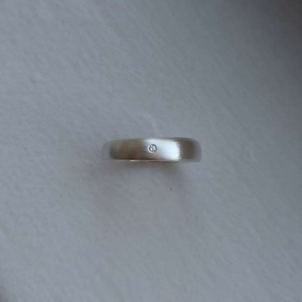 handmade offset ring × with diamond