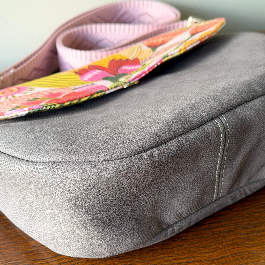 Crossbody bag with zip and flap