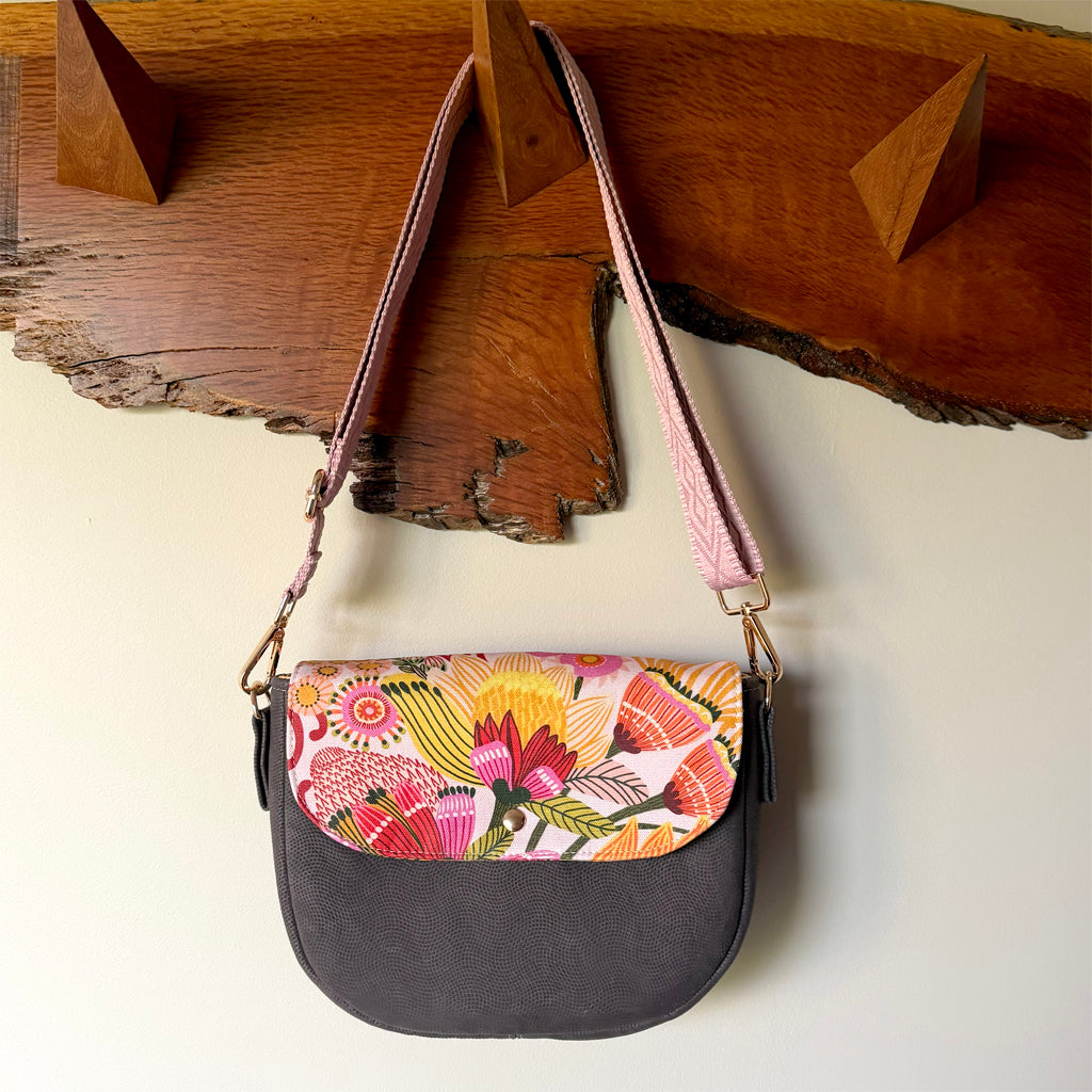 Crossbody bag with zip and flap
