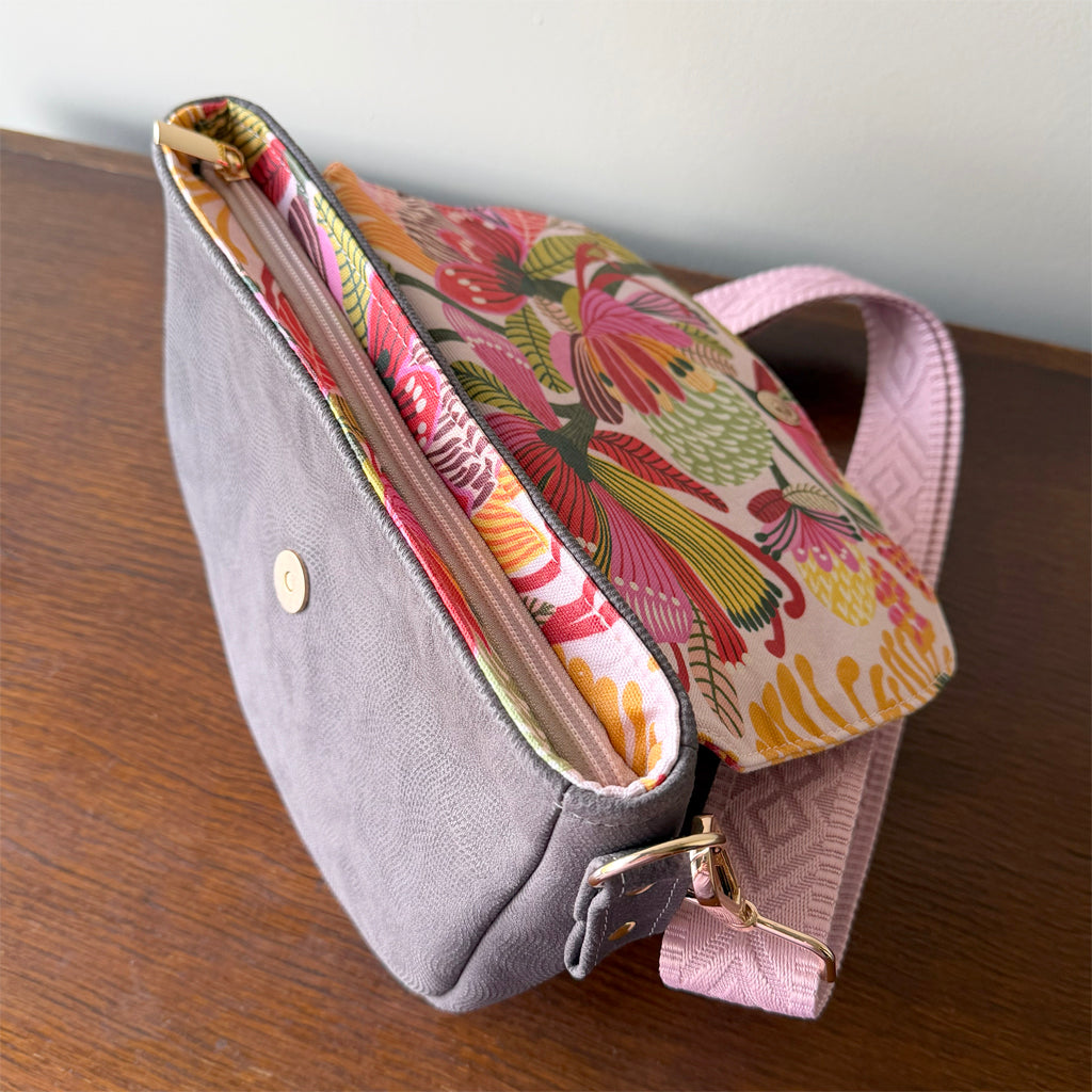 Crossbody bag with zip and flap