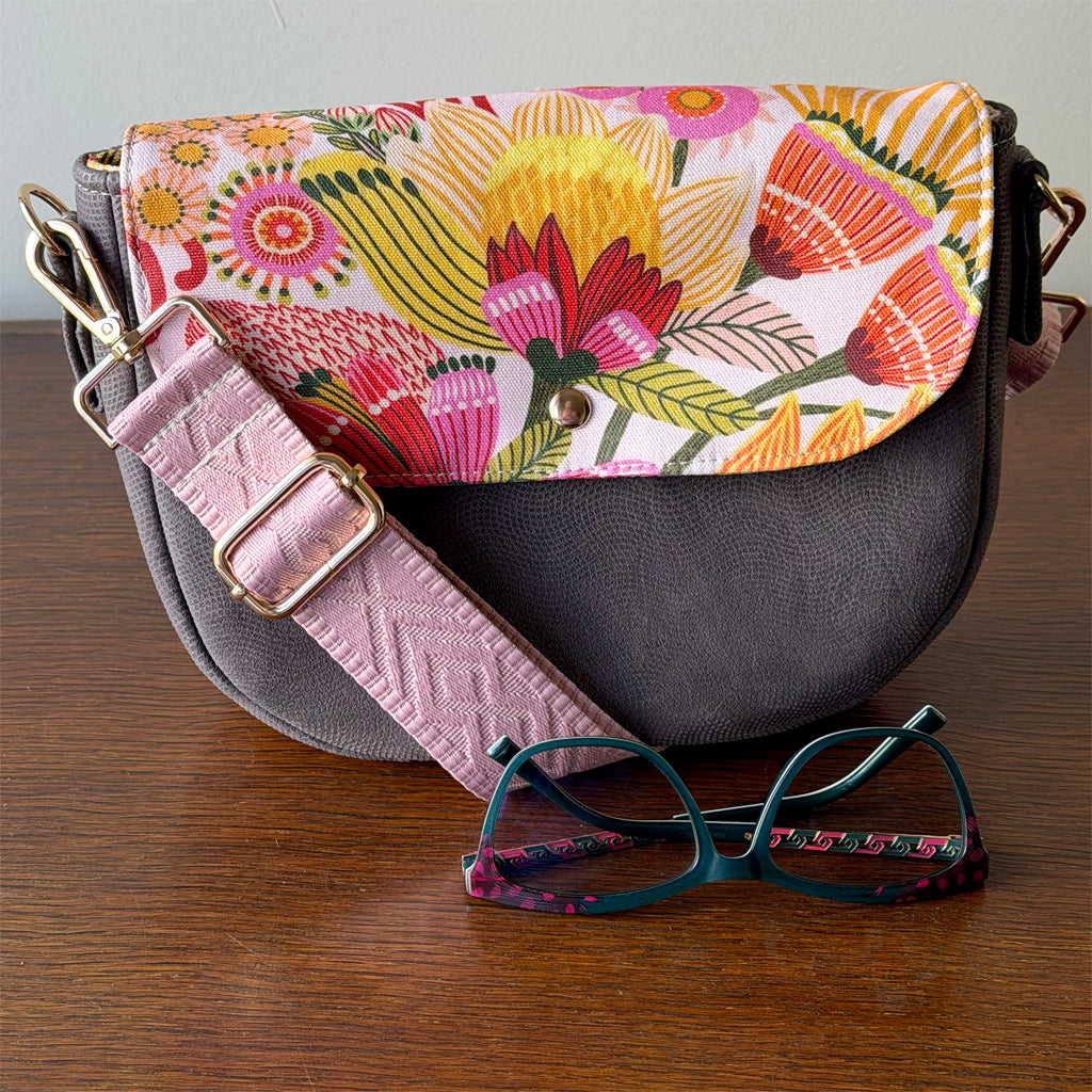 Crossbody bag with zip and flap