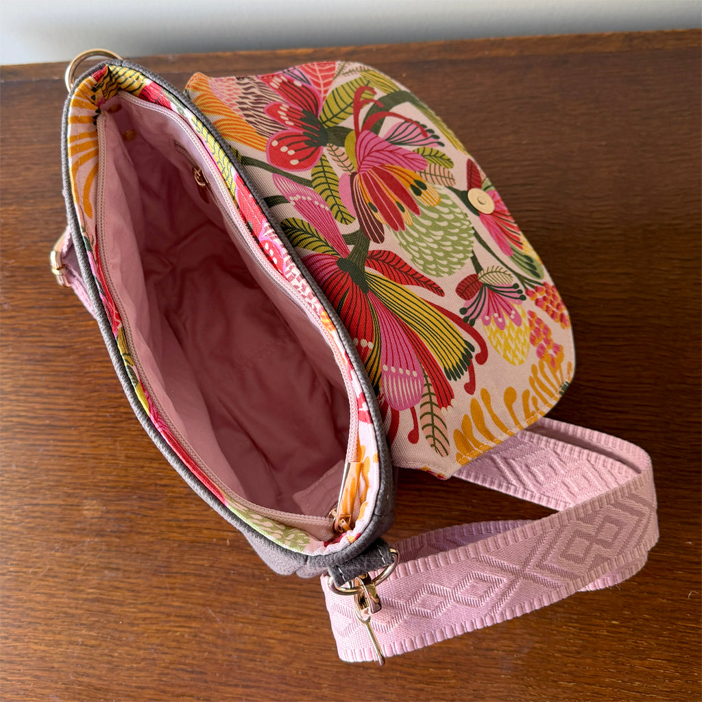 Crossbody bag with zip and flap