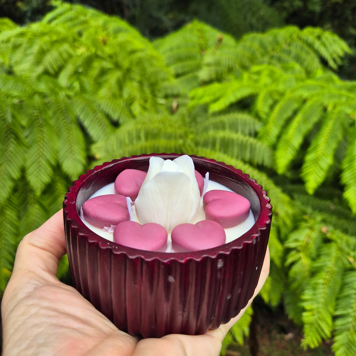 Round burgundy concrete bowl candle with tulip flower