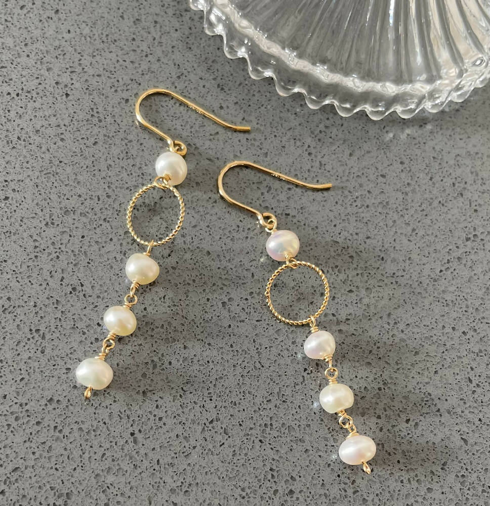 14K Gold filled freshwater pearl earrings with a small gold hoop
