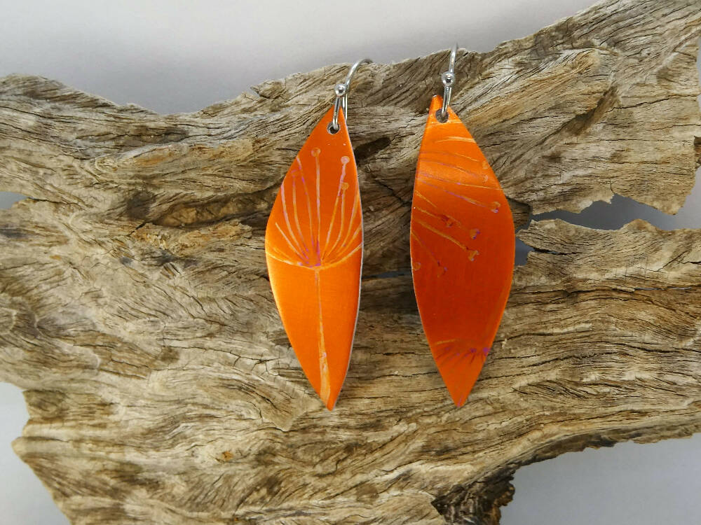 Printed and dyed orange and black anodised aluminium earrings