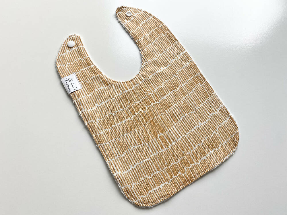 Mustard stripes bib