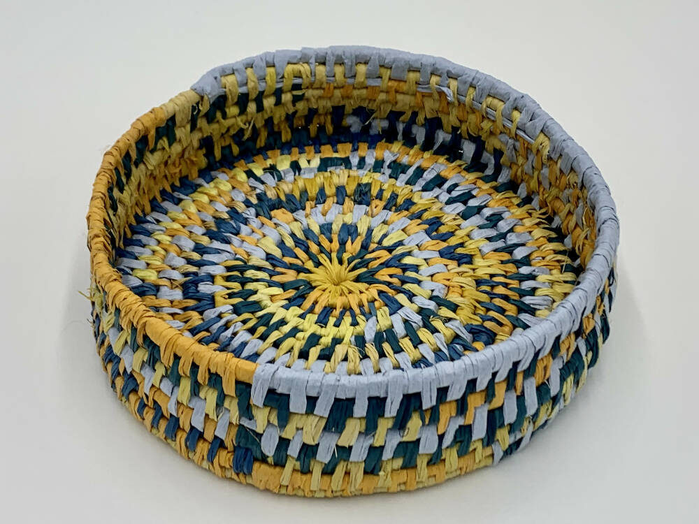Basket in shades of blue and Yellow raffia