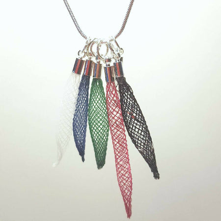 Pendant necklace, Nylon mesh. Silver snake chain.