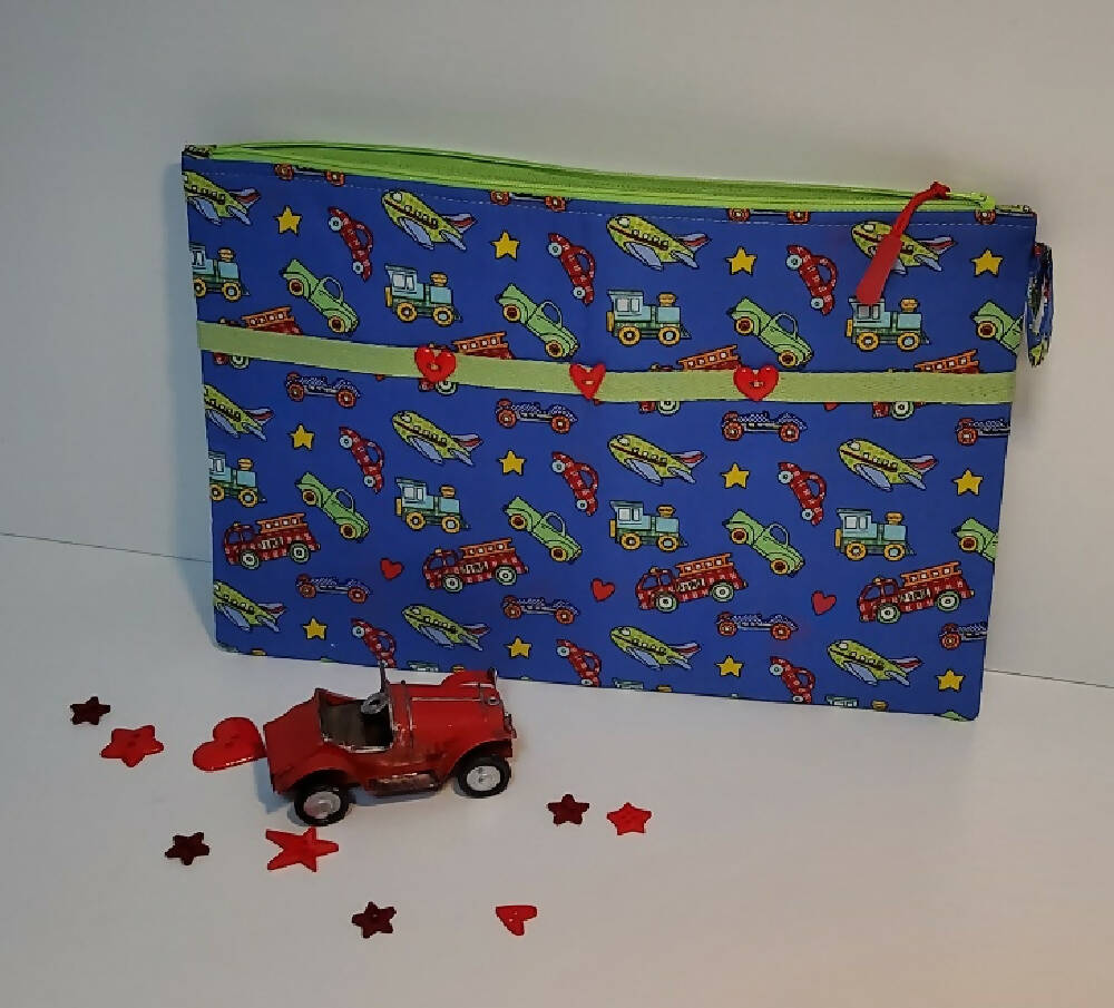 Blue pencil case with red buttons.
