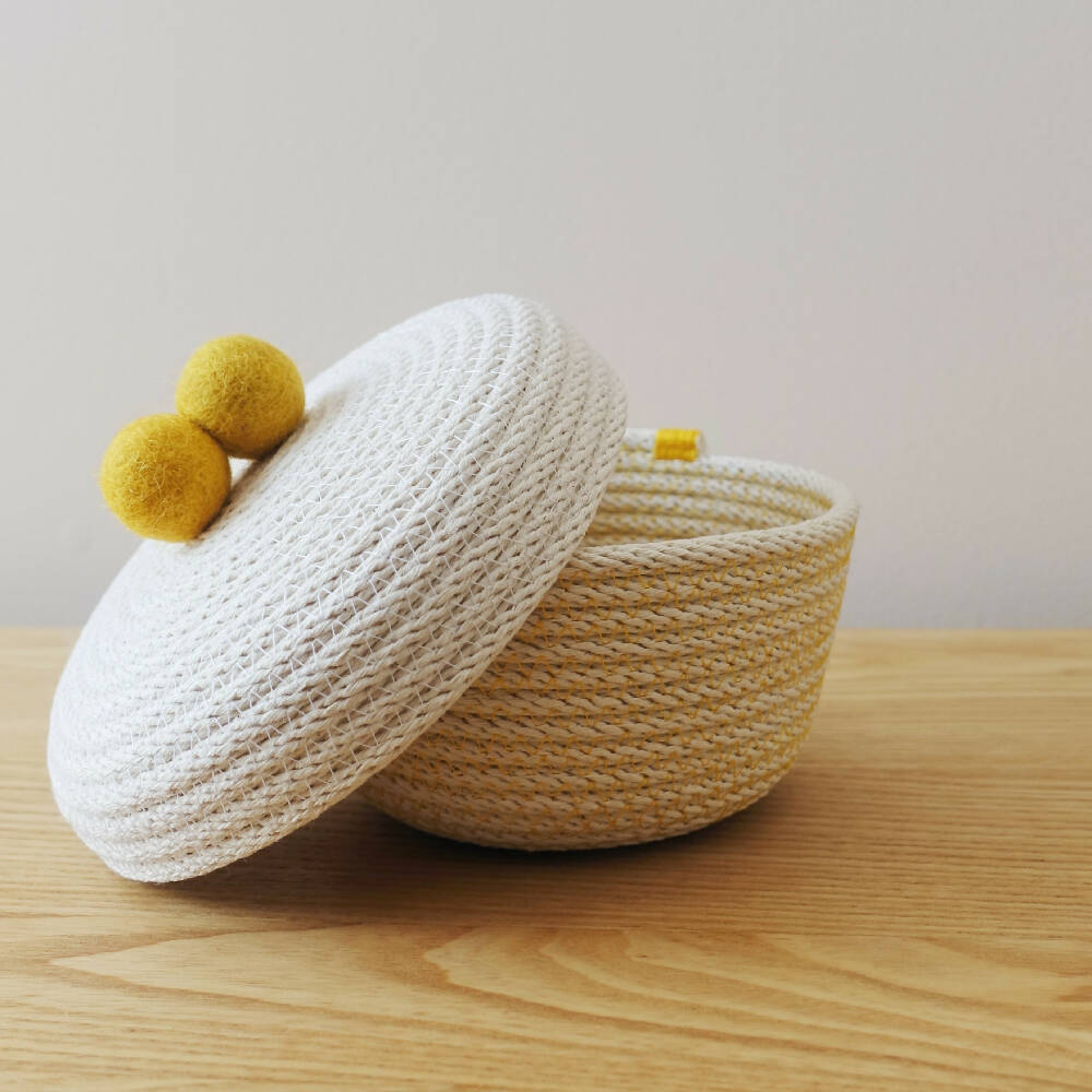 Mustard yellow felt handle 'acorn' lidded bowl
