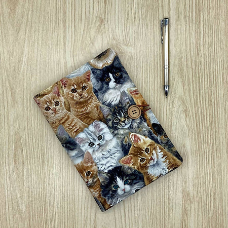 Cats and kittens refillable A5 fabric notebook cover with bonus book and pen.