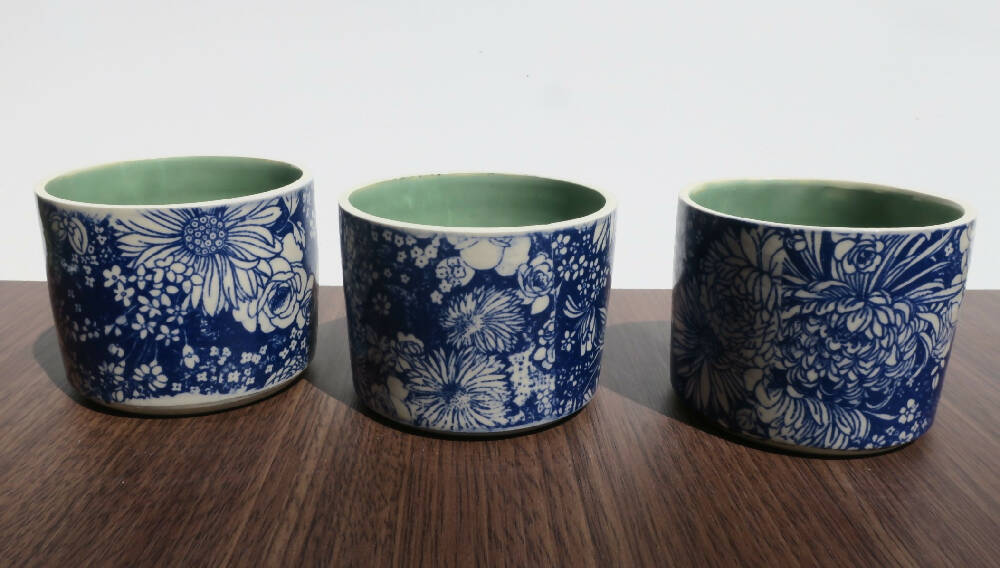 Blue stenciled ceramic planters