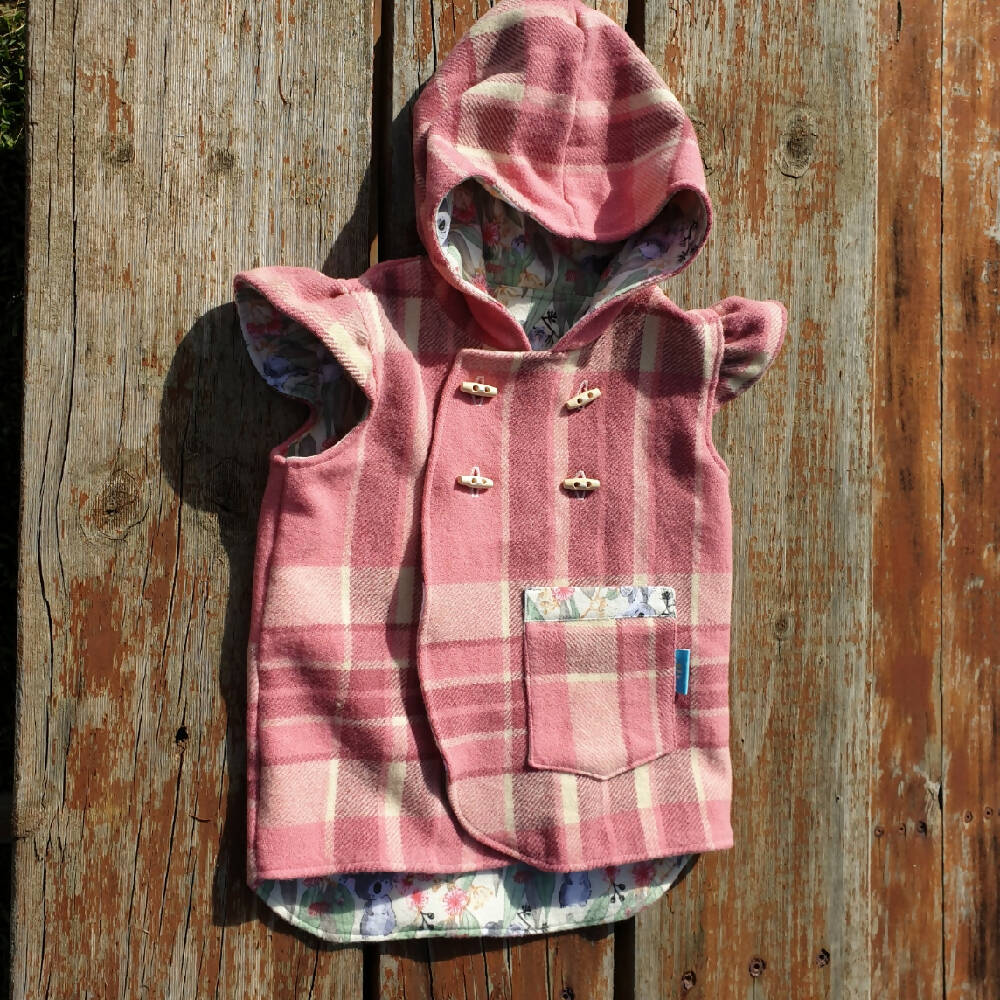 Size 6 Woollen vest with flutter sleeves and hood