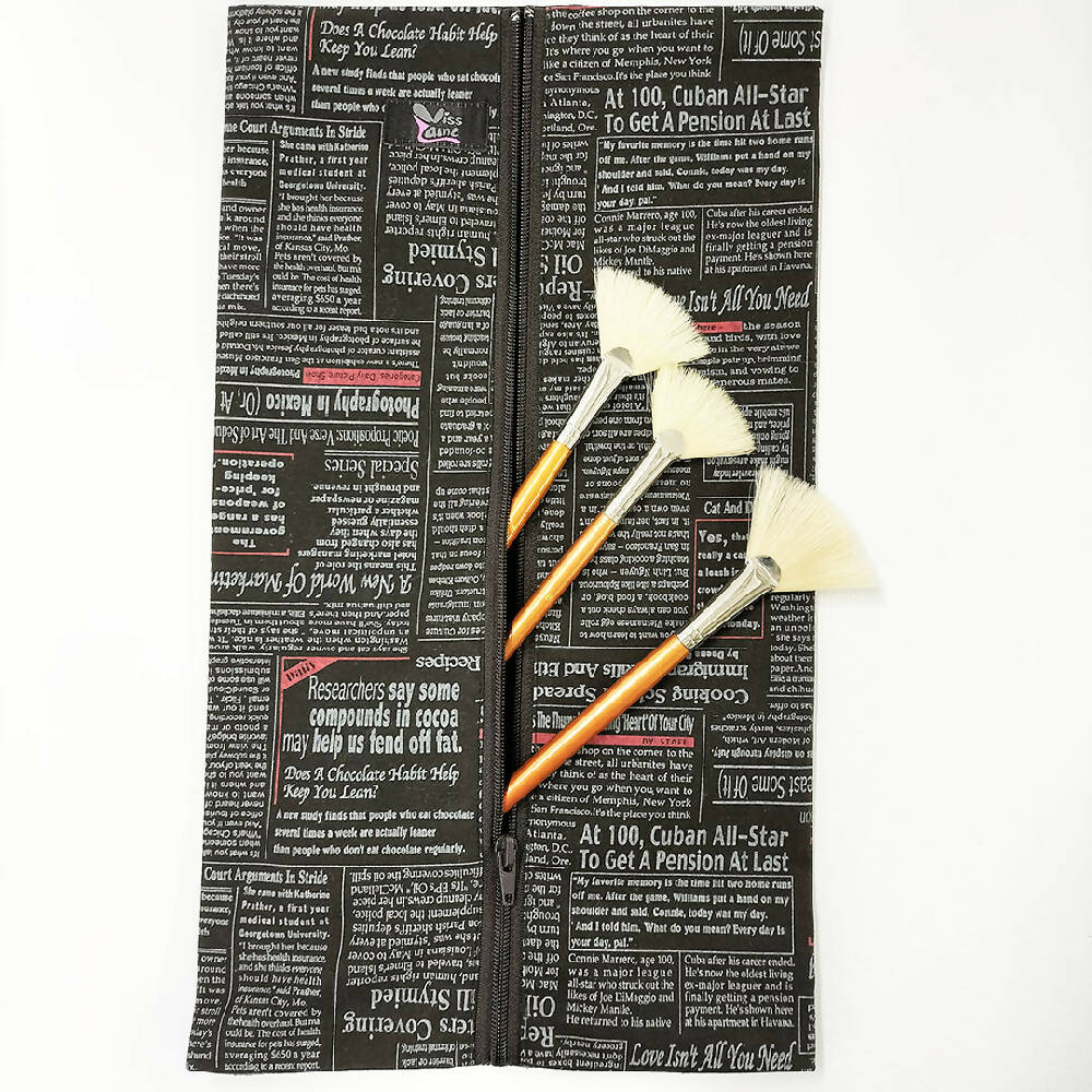 Accessory  waterproof bag. Toiletry bag. Newspaper print