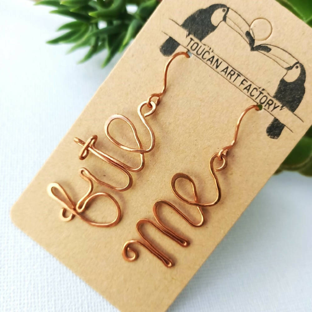 Bite Me Curse-ive Word Dangle Earrings