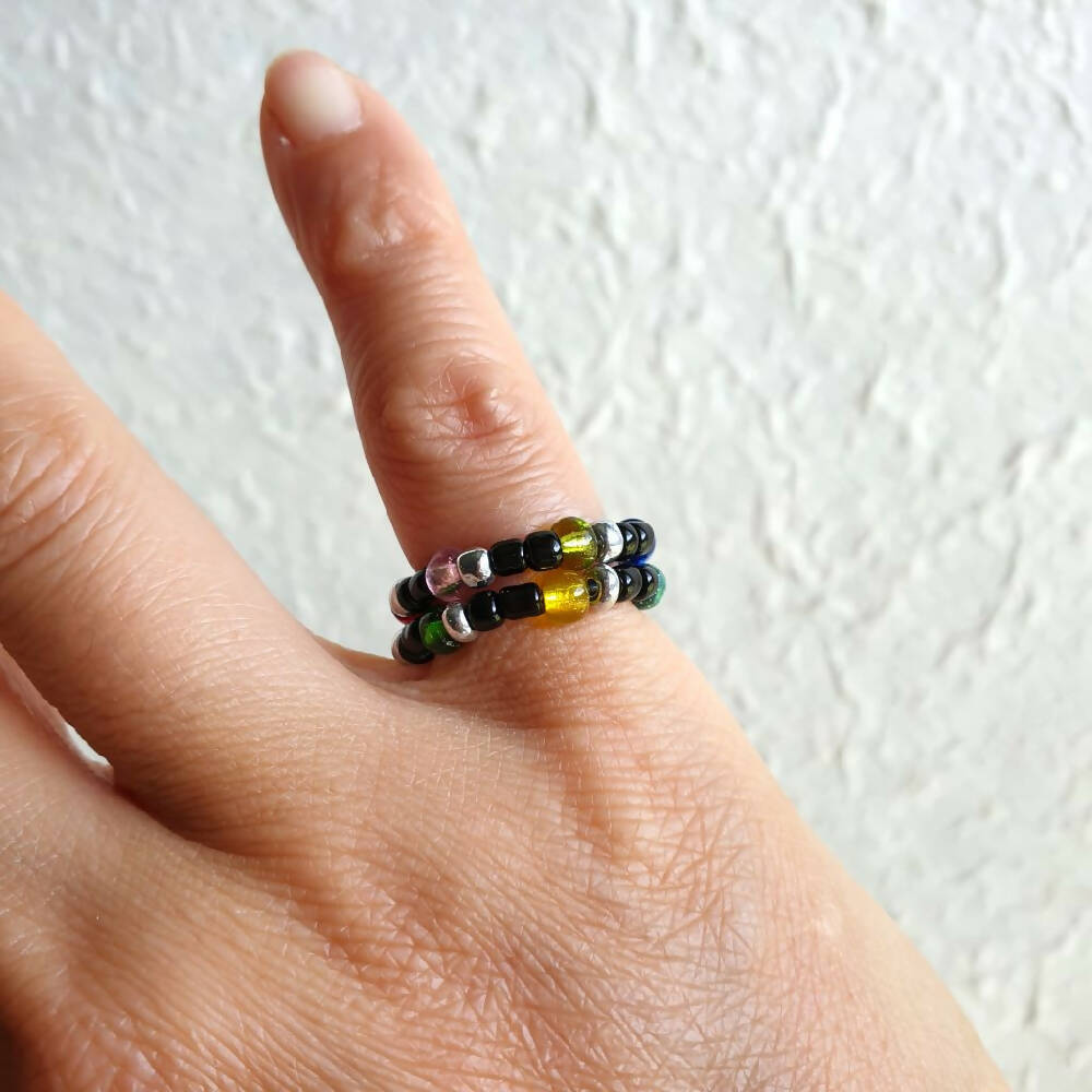 Statement colourful seed bead 2 line memory wire ring , Black & Silver lined