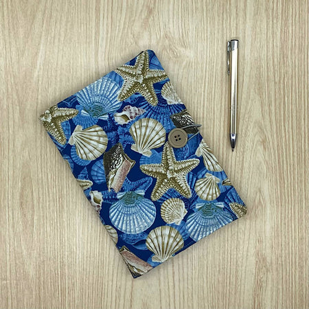 Seashells refillable A5 fabric notebook cover with bonus book and pen.