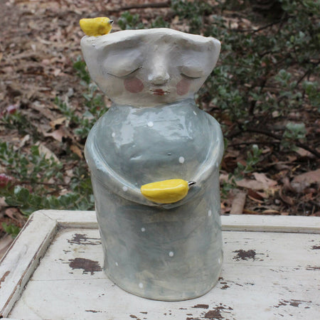 Grey and yellow ceramic tealight holder