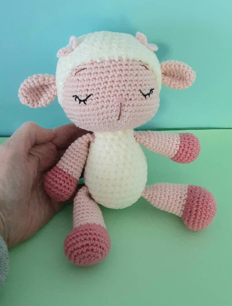 Adorable crocheted lamb baby toy
