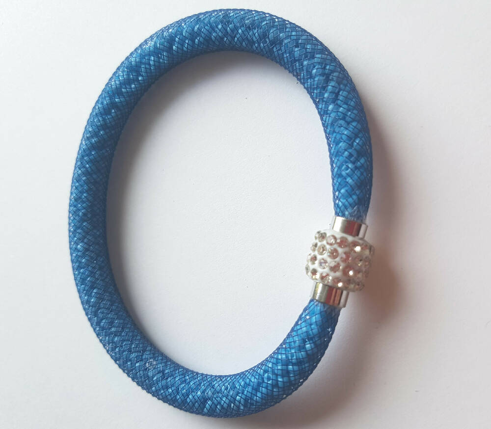 Bangle Bracelet Nylon mesh, bead filled, magnetic clasp.