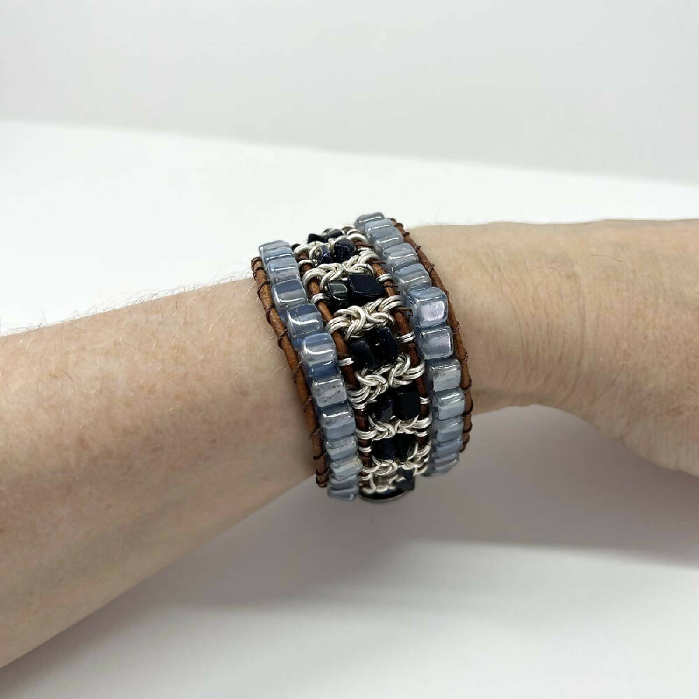 Beaded leather & silver bracelet on arm